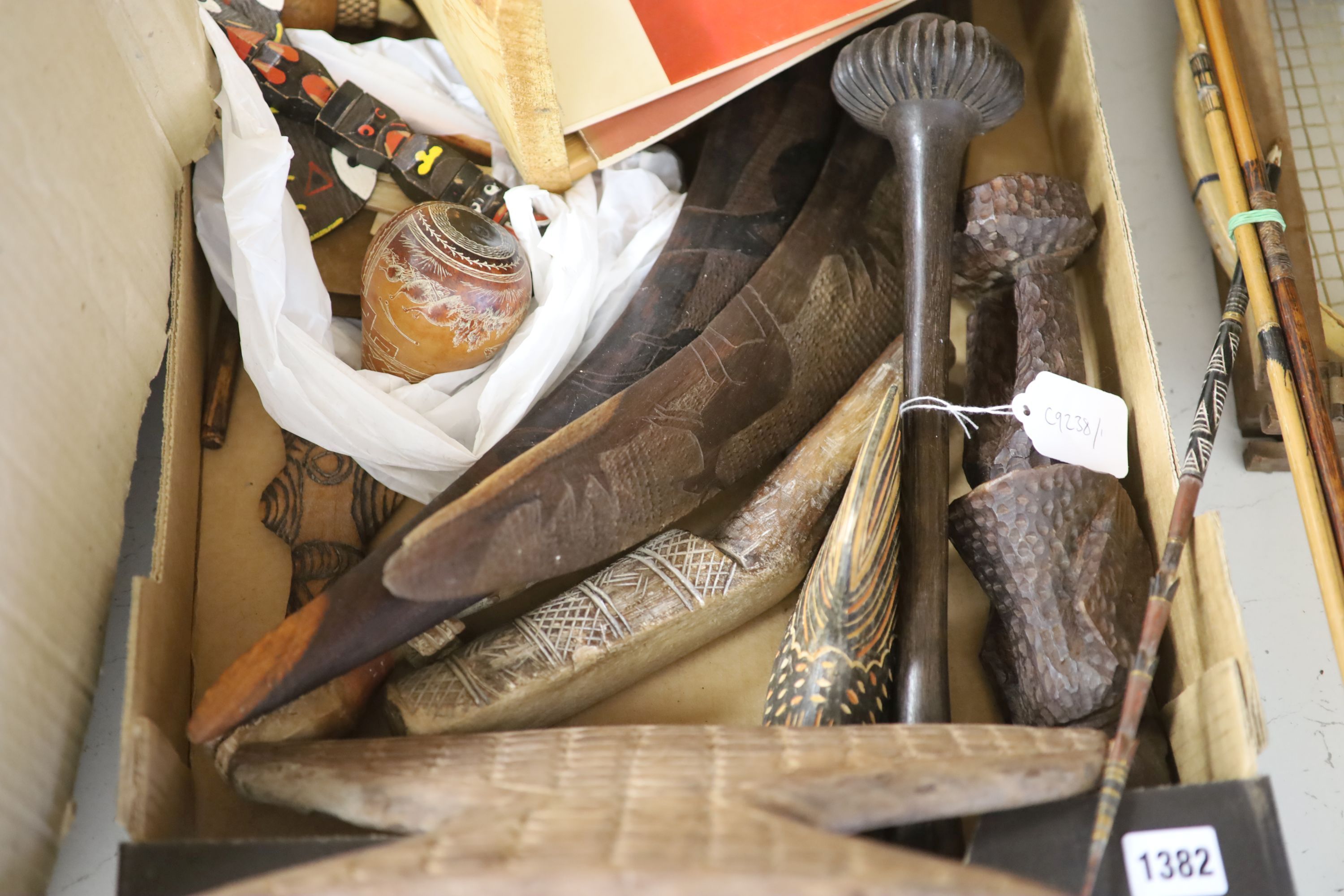 A mixed collection ethnographica to include Fijian throwing club
